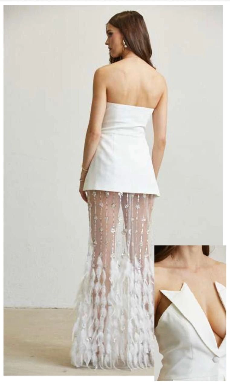 CONJUNTO FALDA CON PLUMAS