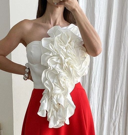 BLUSA FLOR RESALTADA
