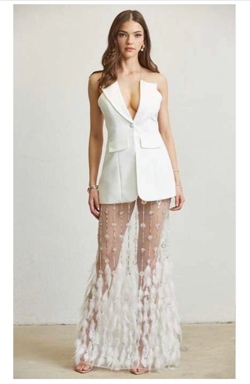 CONJUNTO FALDA CON PLUMAS