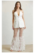 CONJUNTO FALDA CON PLUMAS