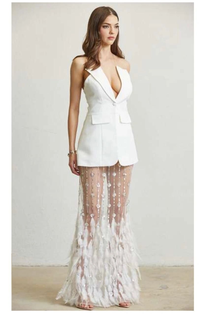 CONJUNTO FALDA CON PLUMAS