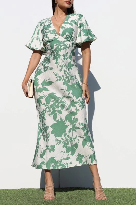 VESTIDO MIDI CON MANGA AMPLIA